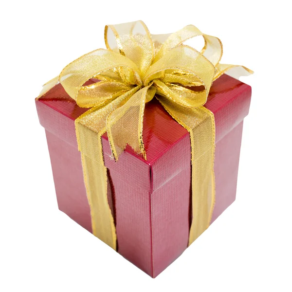 Red gift box with gold ribbon — Stock Photo, Image
