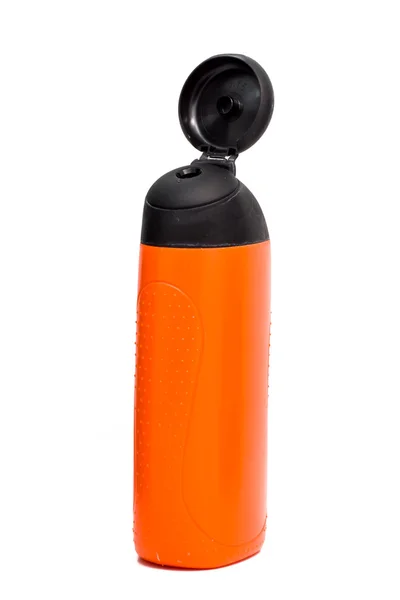 Pomarańczowy butelek z czarny — Zdjęcie stockowe