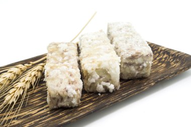 Çin ve Tay tatlı tatlı Taro palm ahşap tabak üzerinde kızarmış