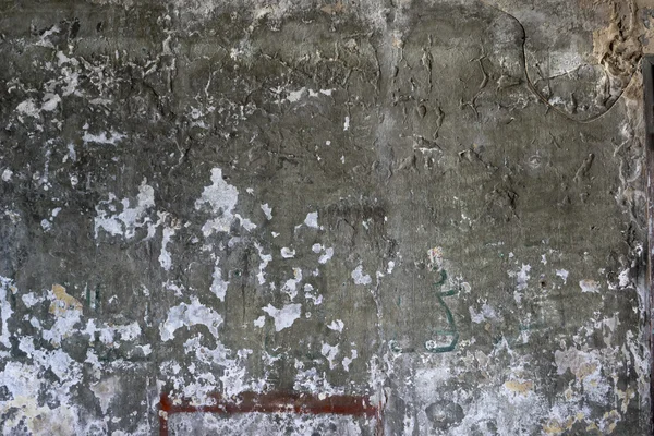 Vecchio muro di cemento danneggiato — Foto Stock