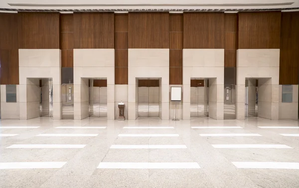 Five elevator doors in office building — Stock Photo, Image