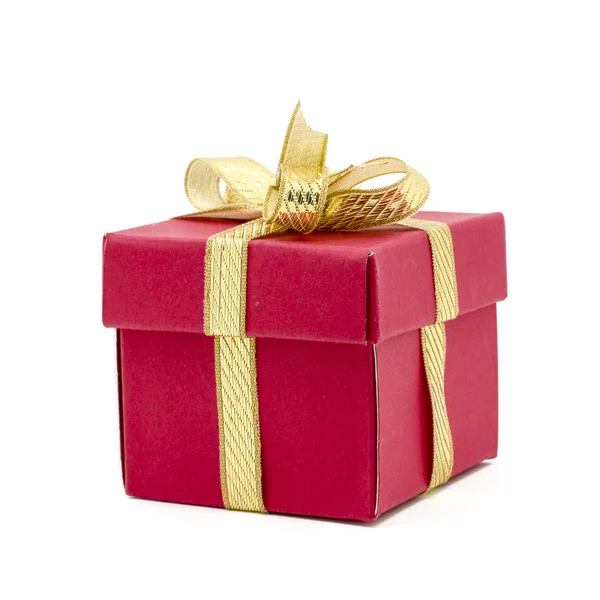 Різдвяна подарункова коробка з золотим стрічковим бантом — стокове фото