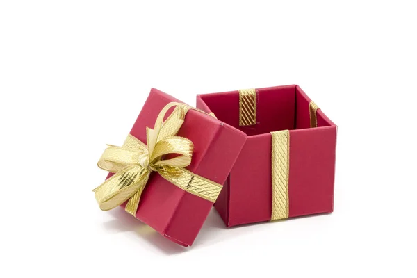 Caja de regalo de Navidad con un lazo de cinta de oro — Foto de Stock