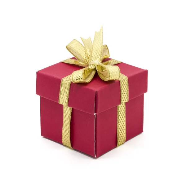 Christmas gift box with a gold ribbon bow — Stock Photo, Image