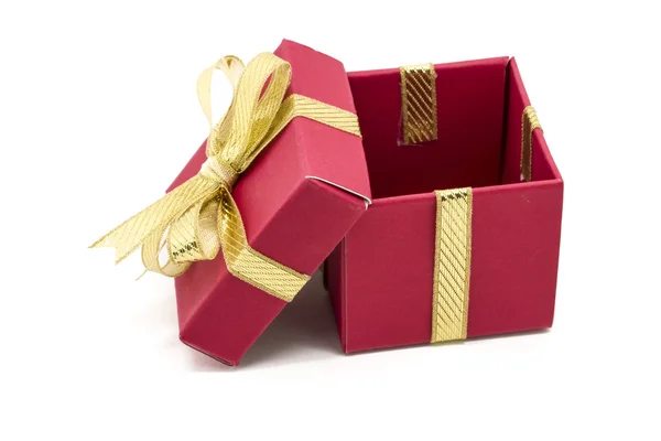 Рождественская коробка с золотой ленточкой — стоковое фото