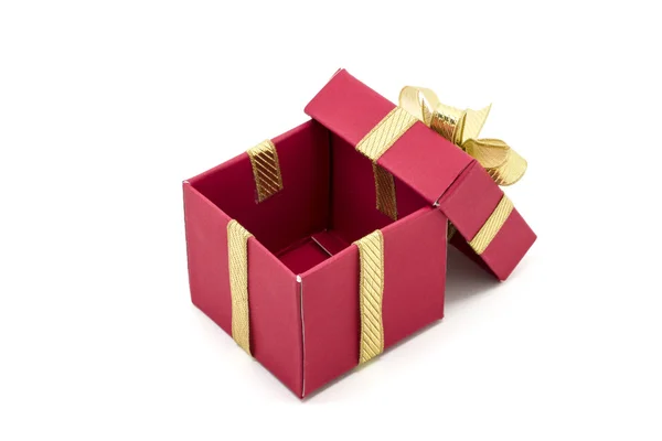 Weihnachtsgeschenkschachtel mit goldener Schleife — Stockfoto