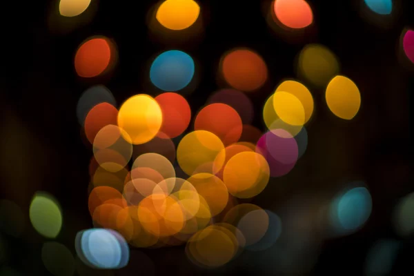 Abstrakter Hintergrund mit Bokeh defokussierten Lichtern — Stockfoto