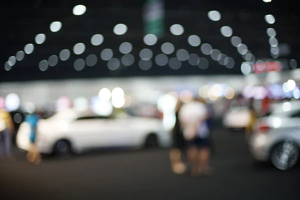 Verschwommenes Foto von der Autoshow, Hintergrund verwendet — Stockfoto