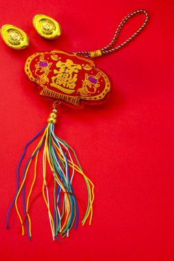 Chinese new year decorations and Auspicious ornaments on red bac