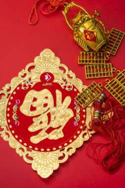 Chinese new year decorations and Auspicious ornaments on red bac