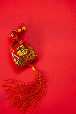 Chinese new year decorations and Auspicious ornaments on red bac