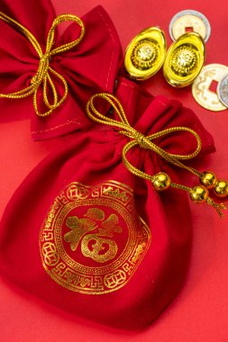 Chinese new year decorations and Auspicious ornaments on red bac