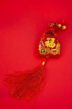 Chinese new year decorations and Auspicious ornaments on red bac