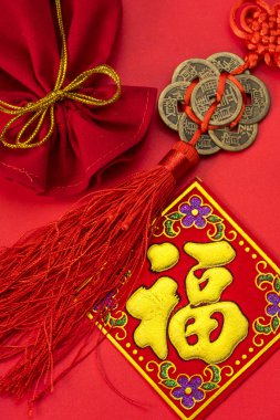 Chinese new year decorations and Auspicious ornaments on red bac