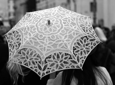 umbrella all hand-decorated with lace doilies and two women clipart
