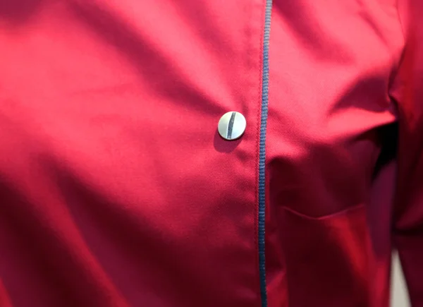 Detail of the button of the dress of a Cook — Stock Photo, Image