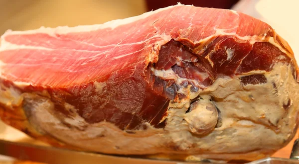 Piece of ham in cured meat platter in Italy — Stock Photo, Image
