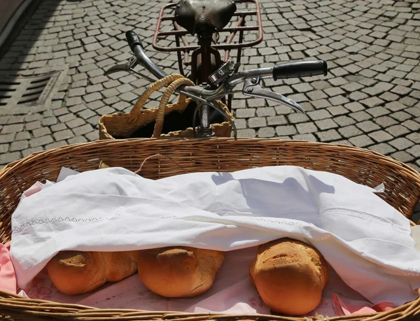 Baker\'s old bicycle with fragrant bread
