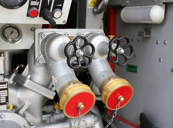 Fire control equipment with taps and hoses of firefighters — Stock Photo, Image