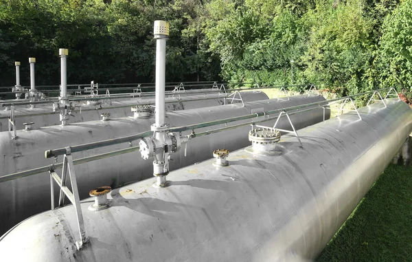 Large pipes and safety valve over pressure vessels — Stock Photo, Image