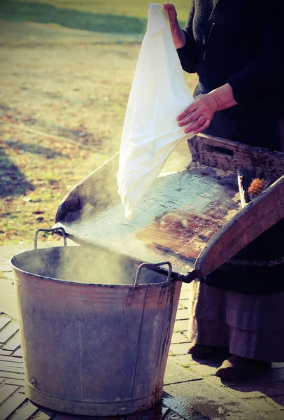 Elderly during washing of the sheet — Stock Photo, Image