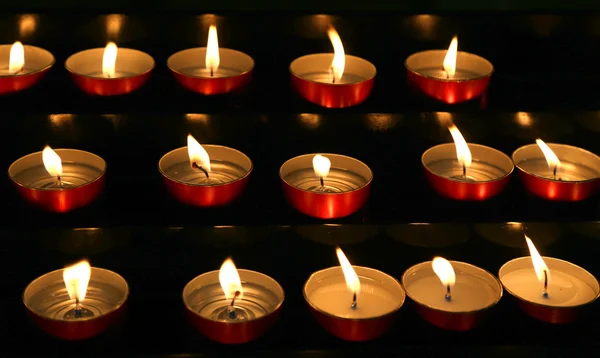 Molte candele accese con fiamma — Foto Stock