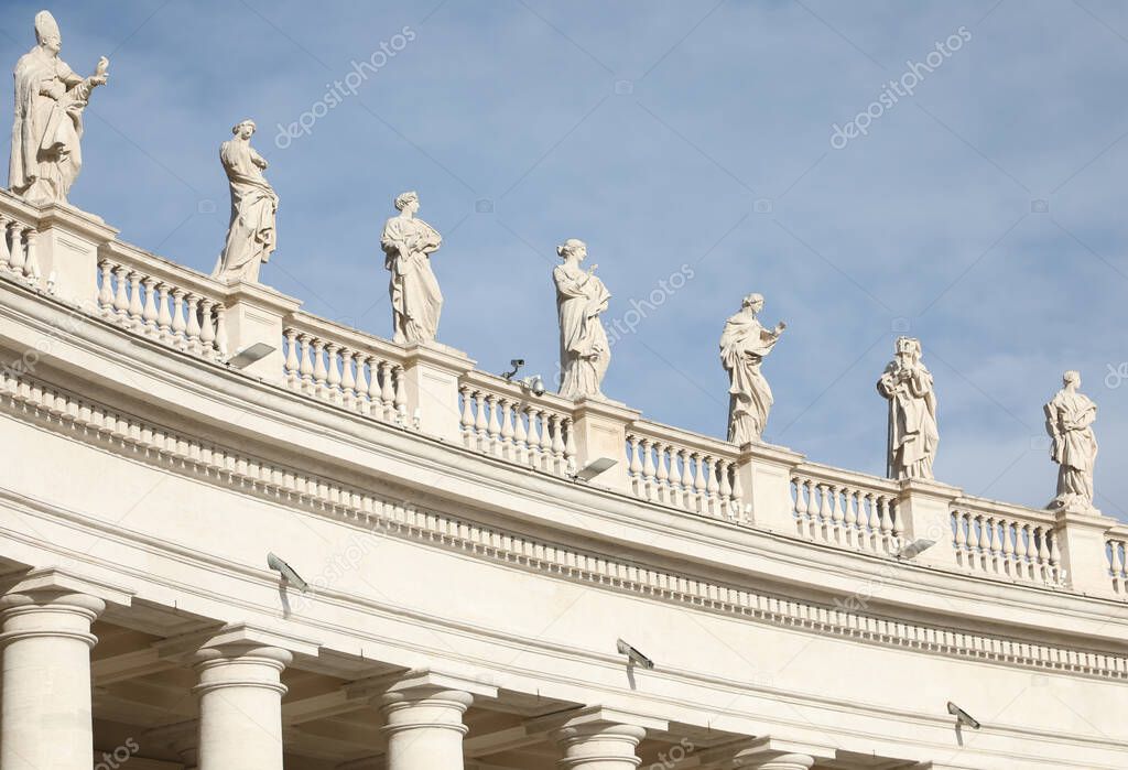 detail of the statues above the colonnade of St. Peter's square in the Vatican city