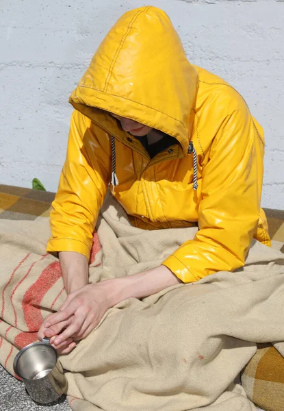 Very Poor Homeless Young Man Yellow Hood His Head While — Stock Photo, Image