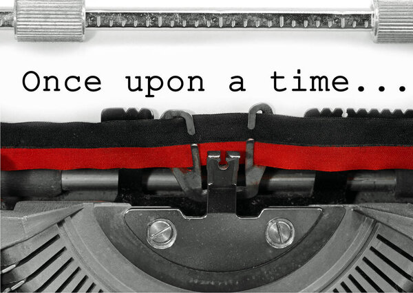 Text Once upon a time written with an old typewriter on white paper