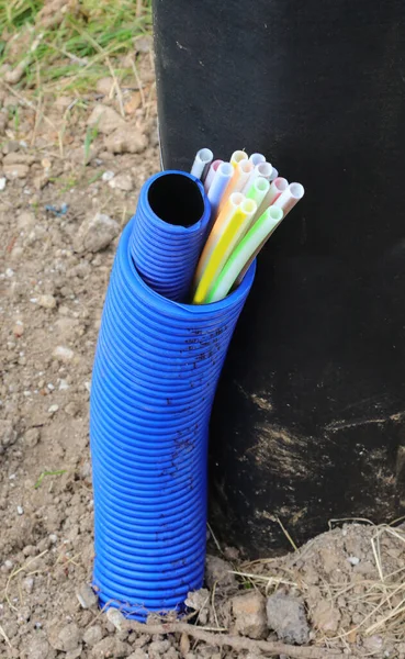 Corrugated Tube Containing Small Colored Tubes Laying Optical Fibers Allow — 图库照片