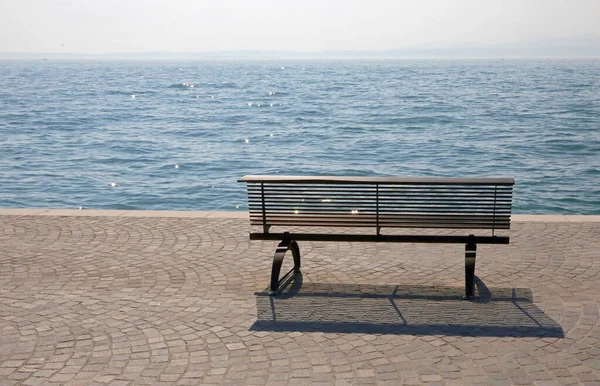 Lonely Bench Shore Placid Water Symbol Tranquility — Stock Photo, Image