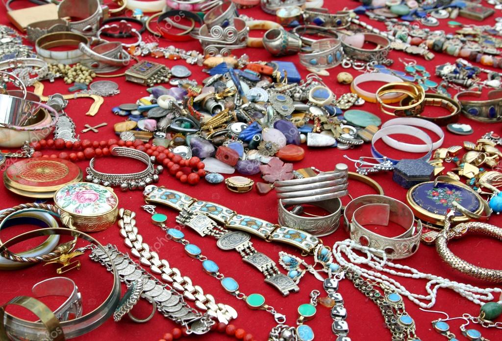 Jewelry and antique object in flea market Stock Photo by