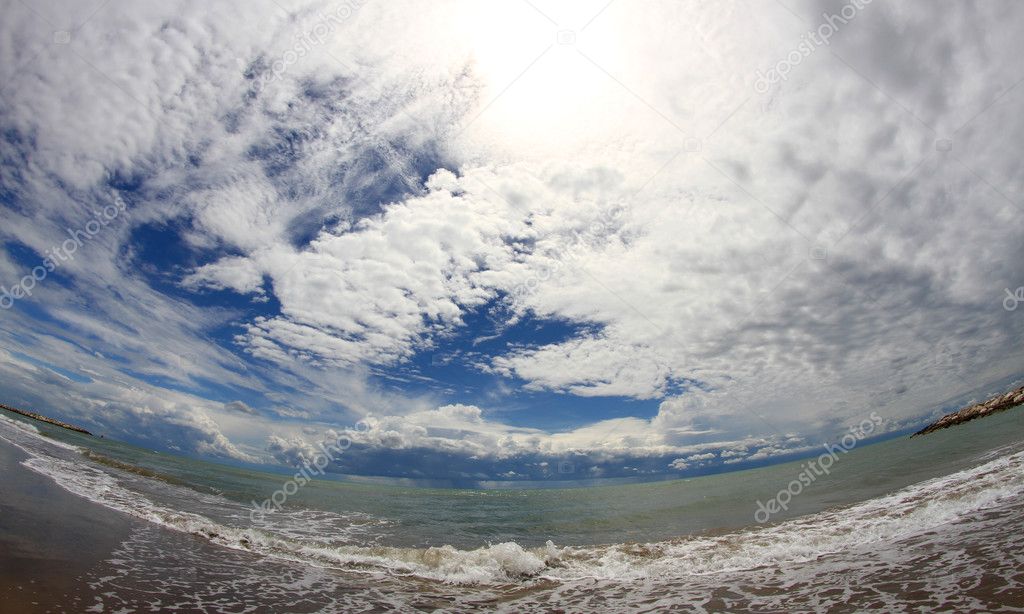 amazing views of the blue sea with the sky full of clouds
