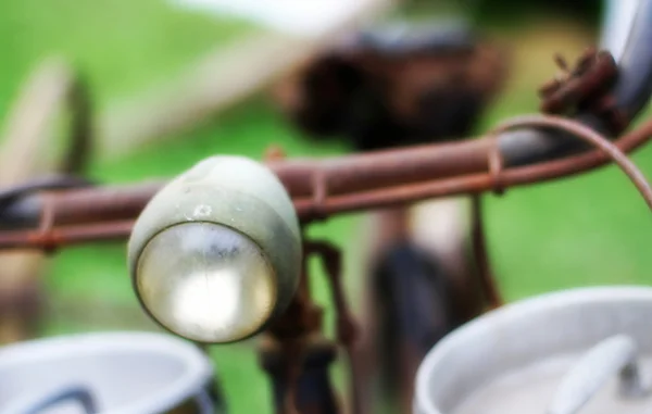 Bike of a milkman with the front lights  of the last century wit — Stock Photo, Image