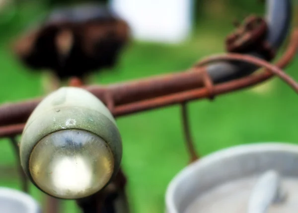 Bike of a milkman with the front lights  of the last century — Stock Photo, Image