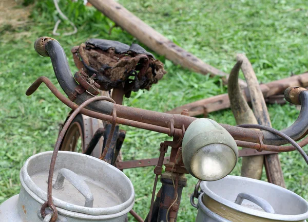 Old bike of the milkman with bins for milk — Stock Photo, Image