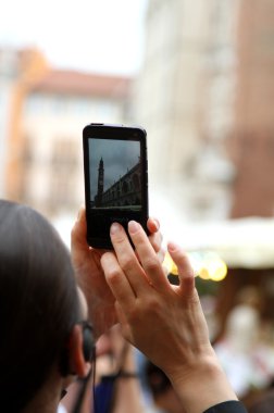 toeristen gefotografeerd met uw mobiele telefoon Italiaanse stad