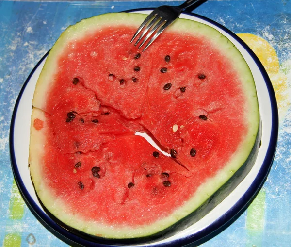 In Scheiben geschnittene Wassermelone roten Kreis mit Samen — Stockfoto