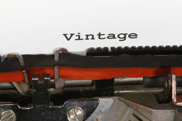 Vintage escrito com tinta preta com a máquina de escrever — Fotografia de Stock