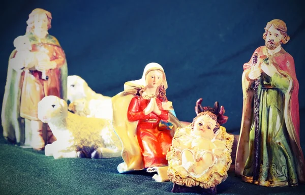 Mary and Joseph with the child Jesus in the manger with a shephe — Stock Photo, Image