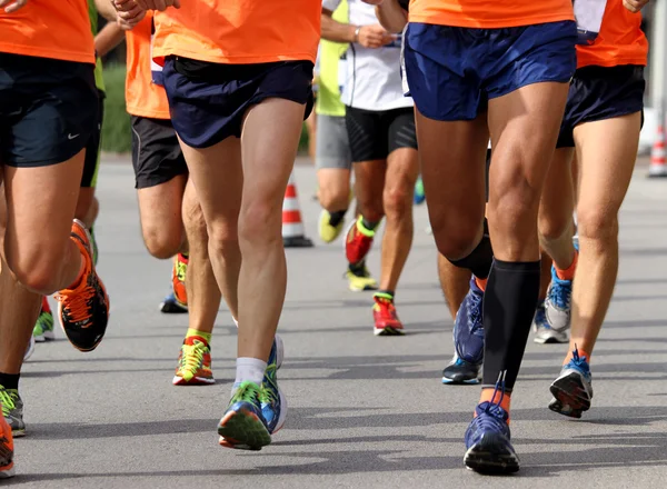 Runners engaged in strenuous Marathon — Stock Photo, Image