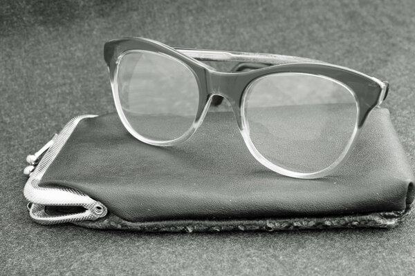 elderly old glasses with black leather case
