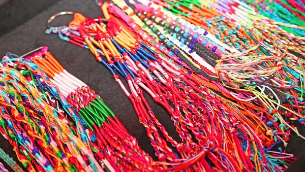 Necklaces colorful wire produced by a craftsman — Stock Photo, Image