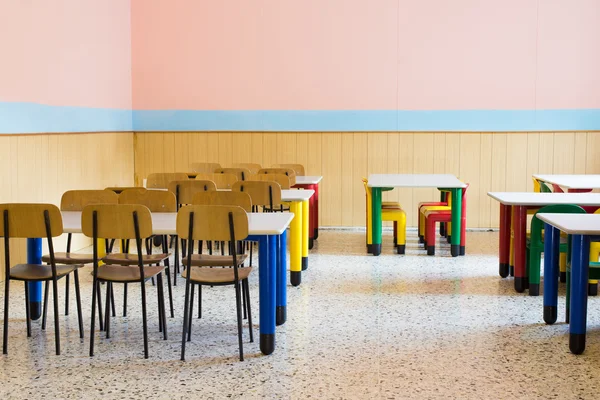 Lunchroom of the refectory of the kindergarten with small benche — Stock Photo, Image