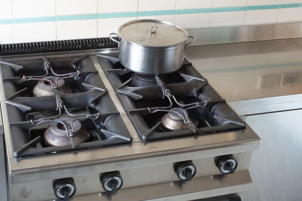 Large pot over the stove of industrial kitchen — Stock Photo, Image