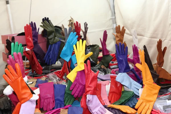 Leather gloves on sale in the local market stall — Stock Photo, Image
