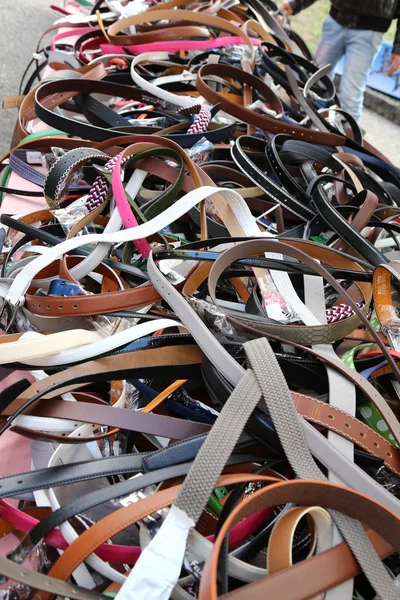 Leather belts on sale in the local market stall — Stock Photo, Image