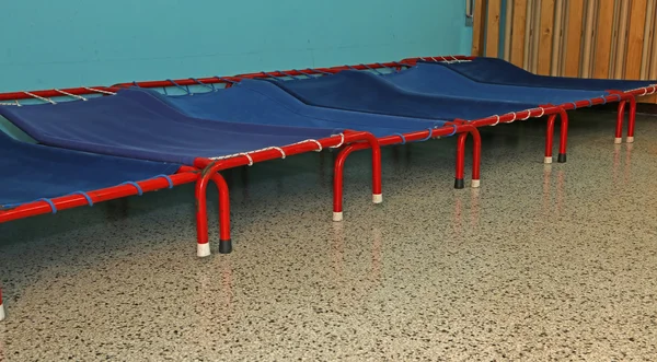 Small beds of a dormitory of kindergarten children — Stock Photo, Image