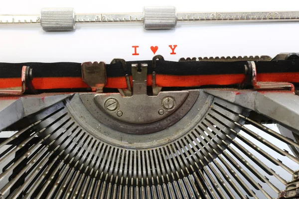 Written typewriter I Love You with red ink — Stock Photo, Image