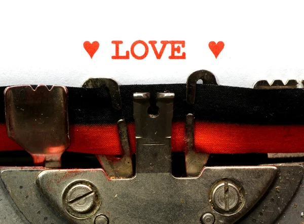 赤インキで書かれたタイプライター愛 — ストック写真